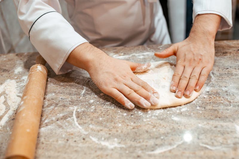 The Cook Prepares a Dish of Dough. Closeup. Stock Image Image of