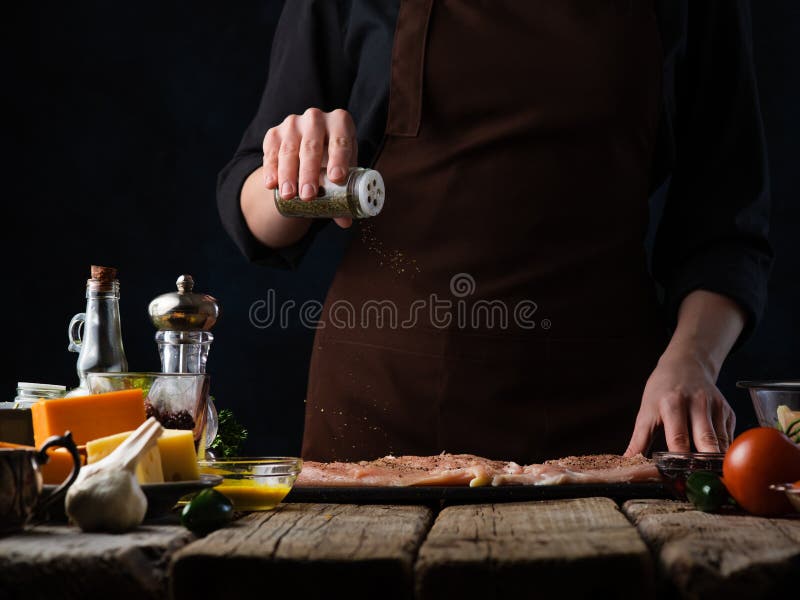 The Cook Prepares Fish Fillets. Delicious, Healthy, Vegetarian Food