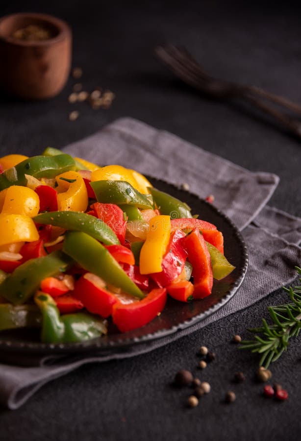 Cooked Bell Peppers of Different Colors, Healthy Vegetable Dish Stock