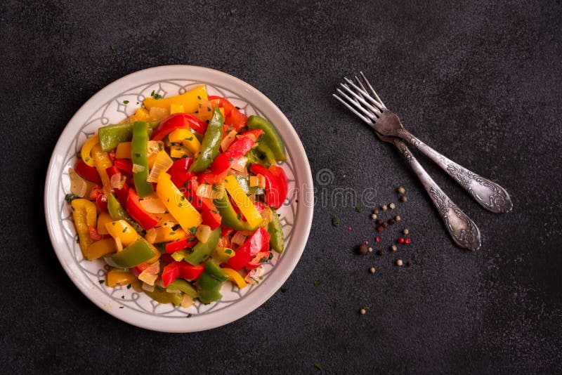 Cooked Bell Peppers of Different Colors, Healthy Vegetable Dish Stock