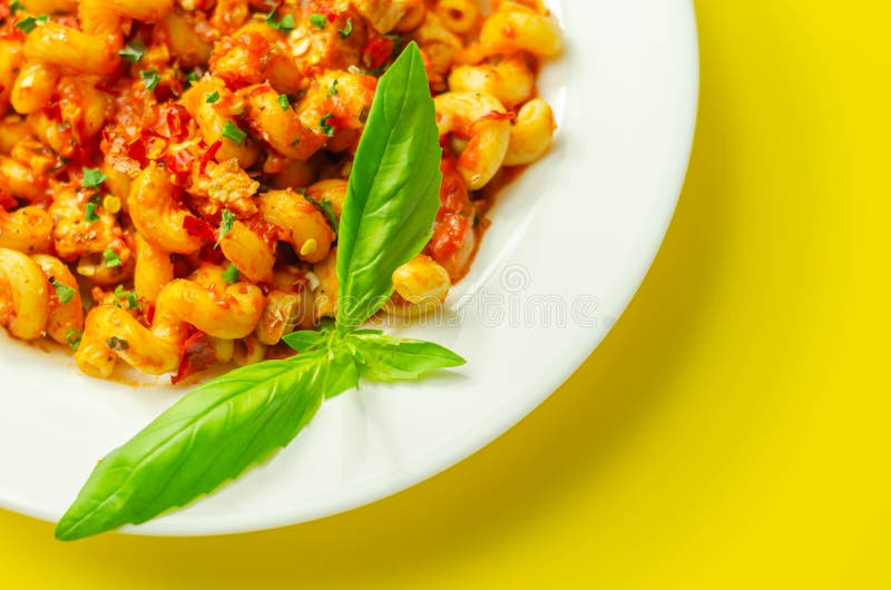 Cooked Cellentani Pasta with Cooked Chicken Breast and Peppers in a
