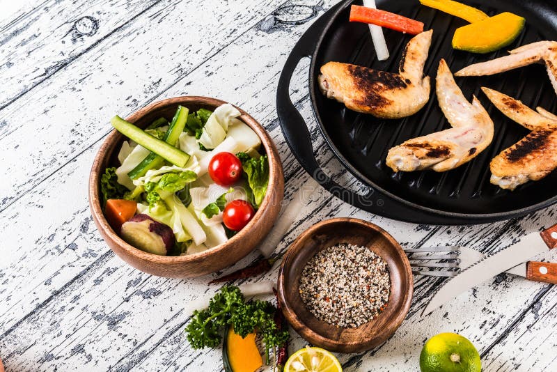Cooked Chicken Dishes and Vegetables and Spices Stock Photo - Image of