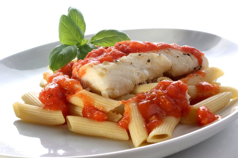 Cooked cod loins with tomato sauce