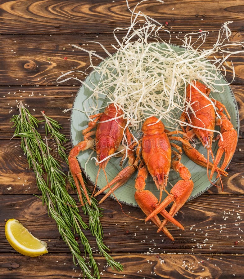 Cooked crawfish on a plate stock photos Cooked crawfish on a plate stock photos