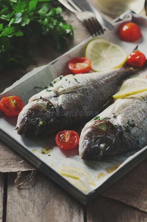 Cooked fish with parsley stock photo. Image of tasty 61393002