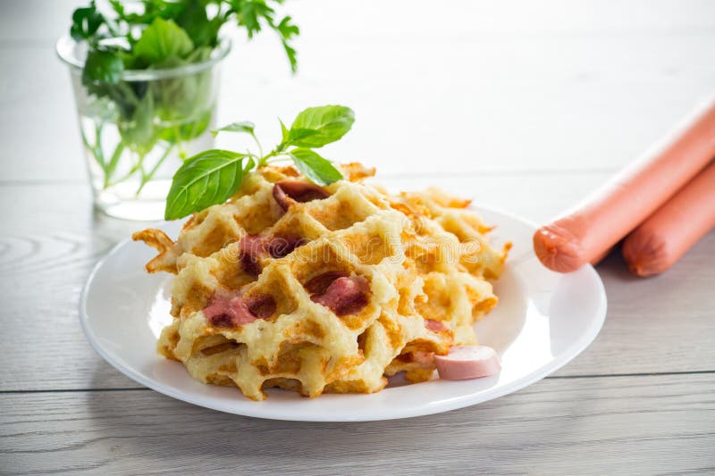 Cooked Fried Potato Waffles with Sausage Stuffing Inside Stock Image