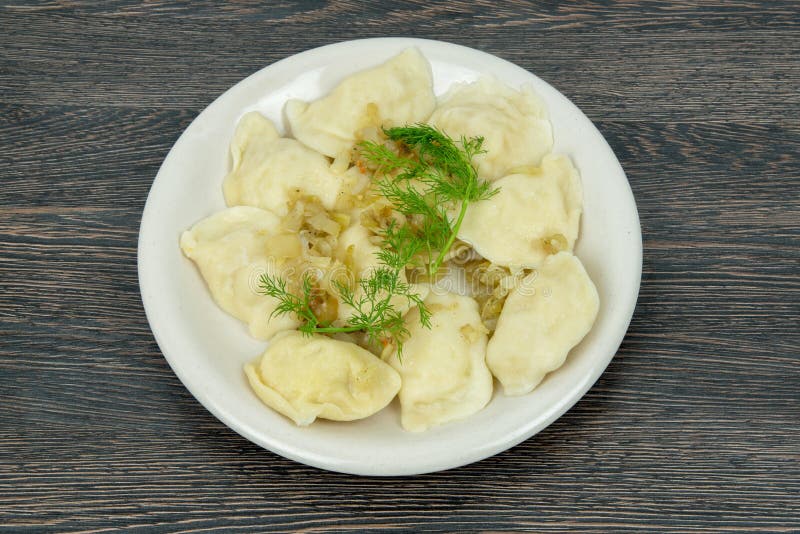 Cooked pierogies with meat