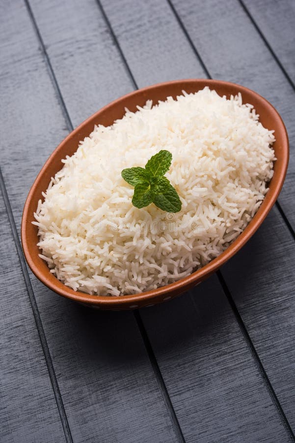 Cooked Plain White Basmati Rice in Terracotta Bowl, Selective Focus