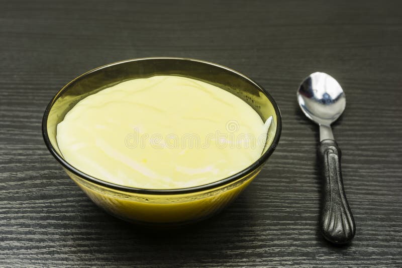 Cooked pudding in a bowl. stock photo. Image of breakfast 107683416