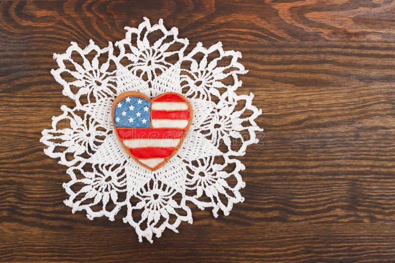 Cookie with American patriotic colors in the hands