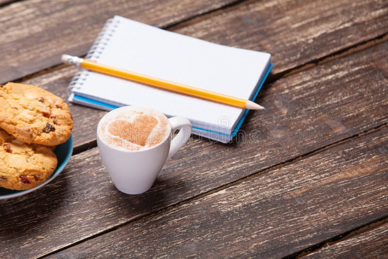 Cookie and cup with coffee stock photo. Image of cafe 43362840