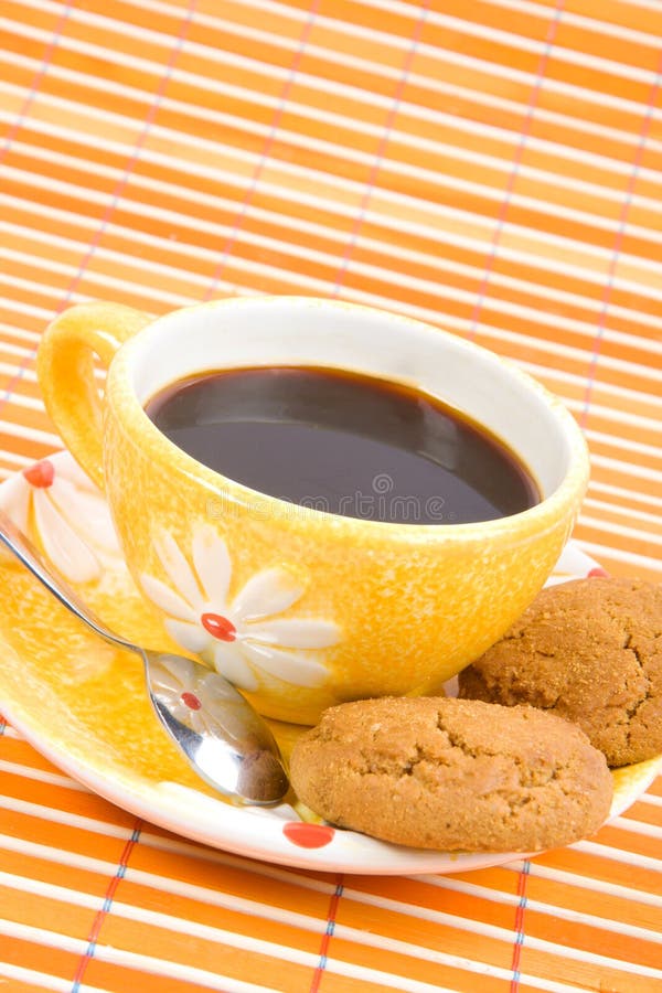 Cookies and cup with coffee