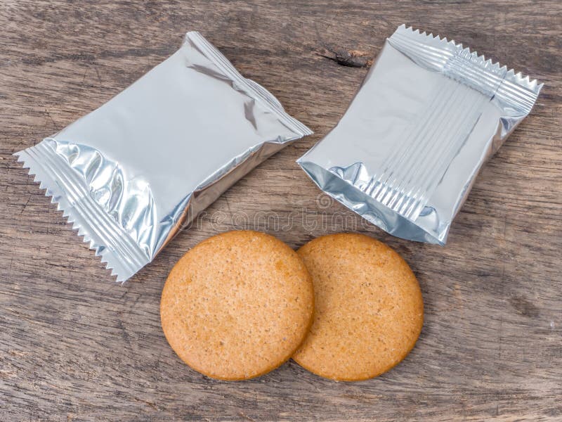 Cookies and foil package stock image. Image of chromium 65028707