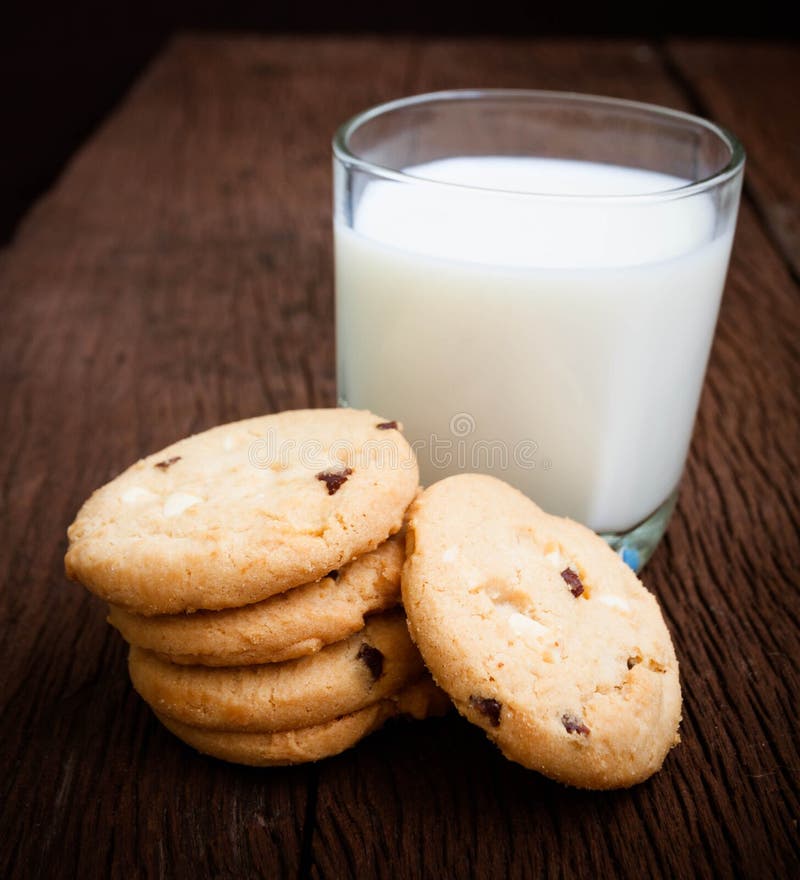 Cookies and glass milk stock photo. Image of drink, brown 35353774