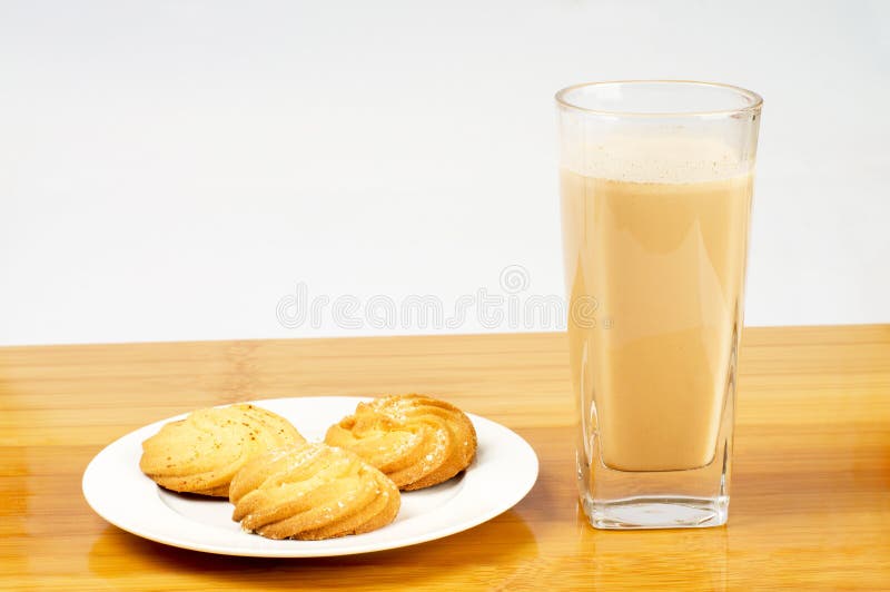 Cookies and milk tea stock photo. Image of milk, plates 26410420