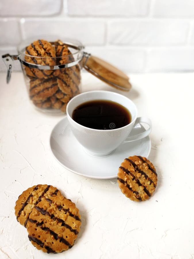 Cookies Polished With Chocolate And Peanut Pieces In A Glass Jar With A