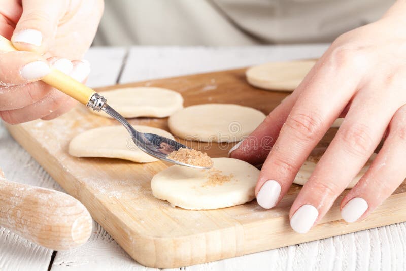 Cookies, Production of flour products. Hands close-up stock photo