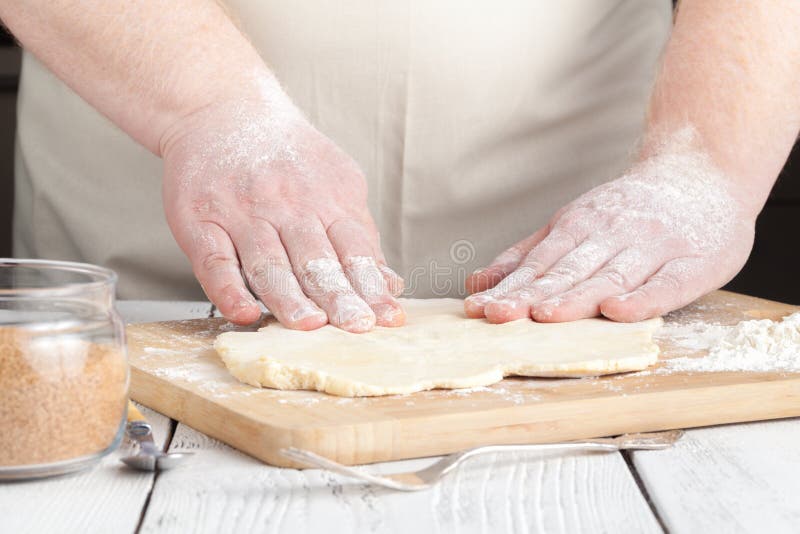 Cookies, Production of flour products. Hands close-up stock image