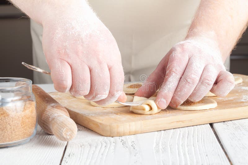 Cookies, Production of flour products. Hands close-up stock photography