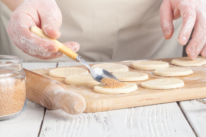 Cookies, Production of flour products. Hands close-up stock photo