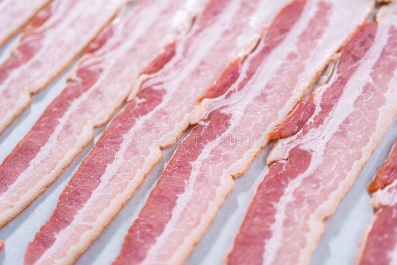 Cooking bacon strips stock photo. Image of preparing 271277096