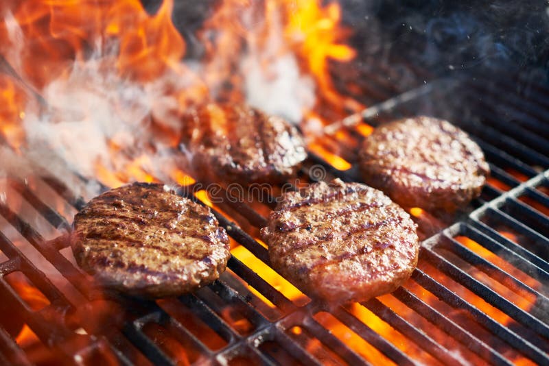 Grilling Burgers and Hot Dogs Stock Image - Image of meat, cooked: 6459093