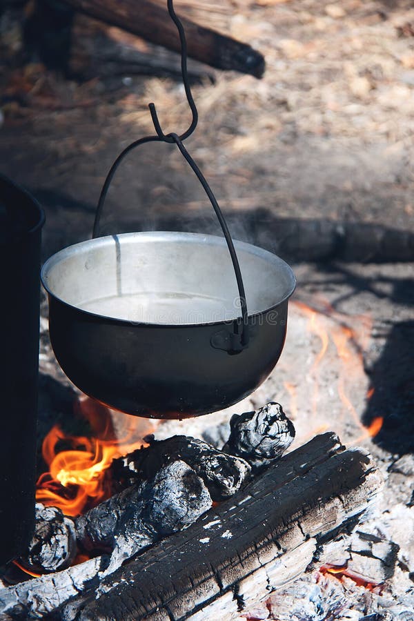 Cooking in a Camping Trip, Outdoor Kitchen. Stock Image - Image of burn