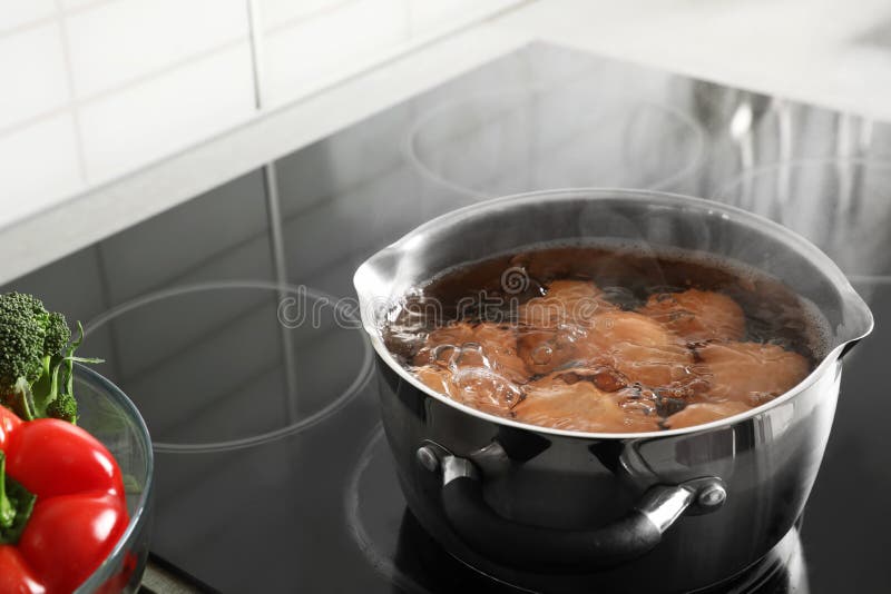 Cooking Chicken Eggs in Pot on Electric Stove Stock Photo Image of