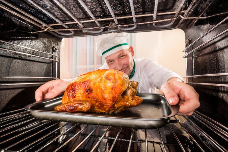 Cooking Chicken in the Oven at Home. Stock Photo Image of food, bird