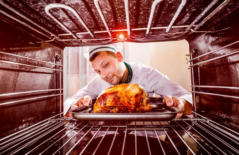 Cooking Chicken in the Oven. Stock Photo Image of chef, dinner 46543186