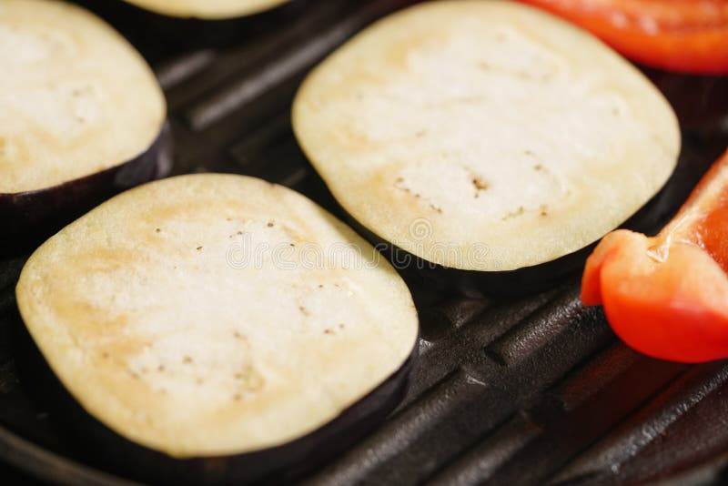 Cooking Eggplant and Pepper on Grill Pan Stock Photo Image of kitchenware, cookware 96195002