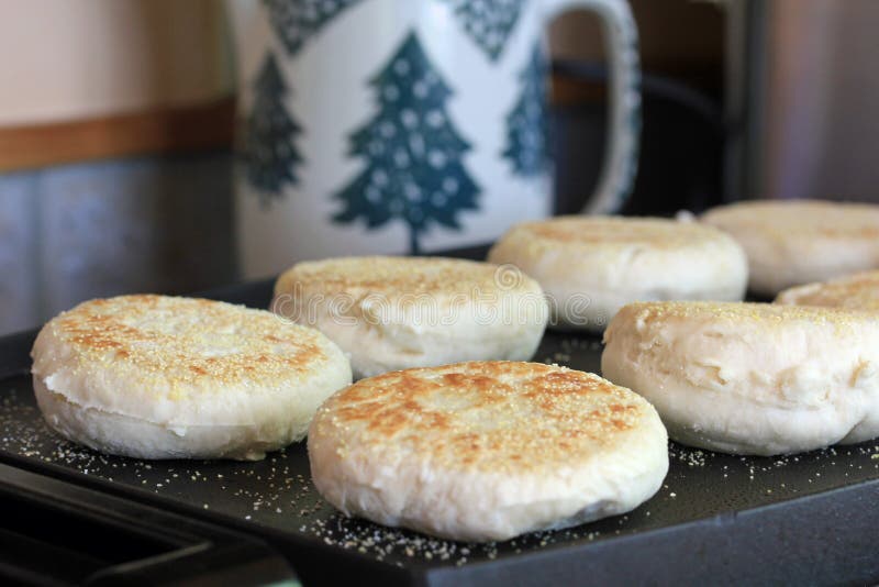 Cooking English Muffins stock photo. Image of english 15841318