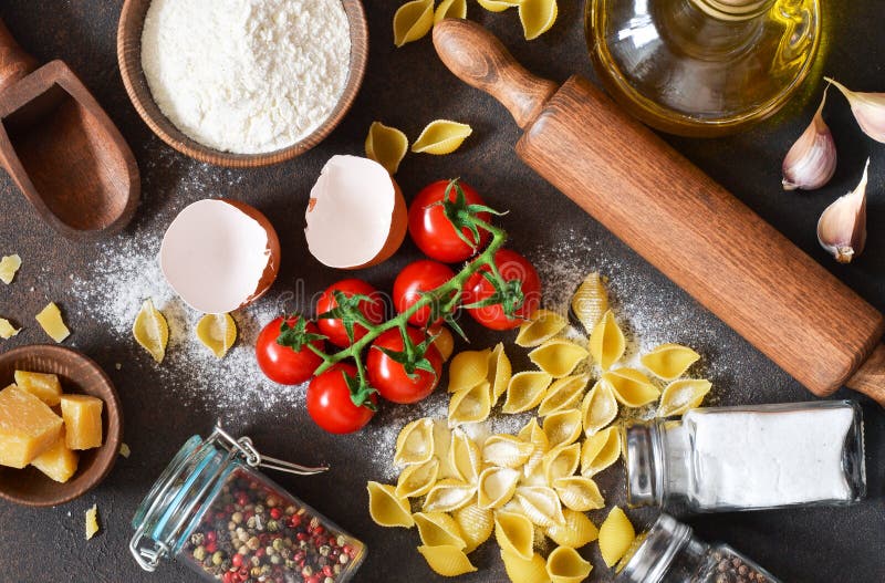 Cooking Italian Pasta In A Rustic Kitchen Stock Photo Image of herb, tomato 45523862