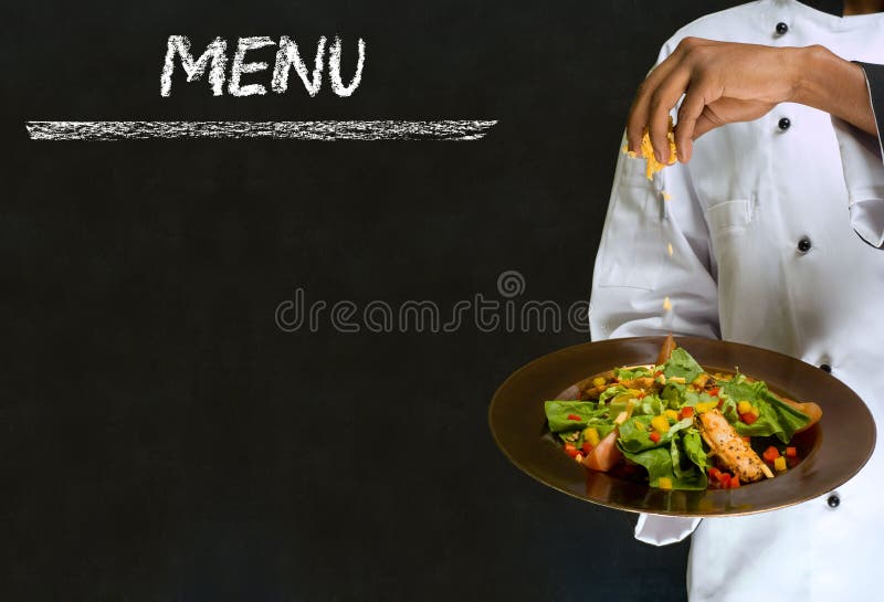 Chef with healthy salad food on chalk blackboard m royalty free stock images Chef with healthy salad food on chalk blackboard m royalty free stock images
