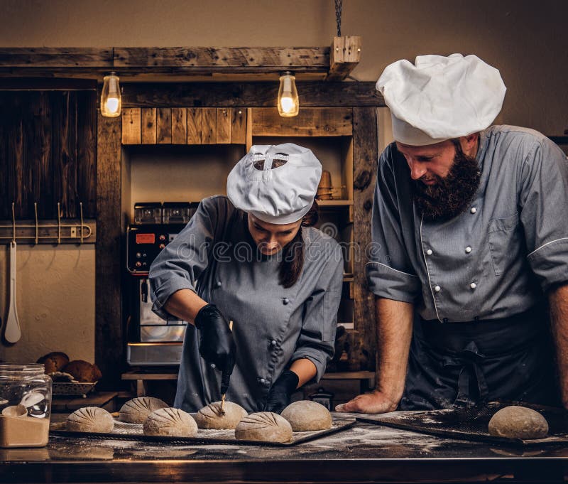 Cooking Master Class in Bakery. Chef with His Assistant Showing Ready