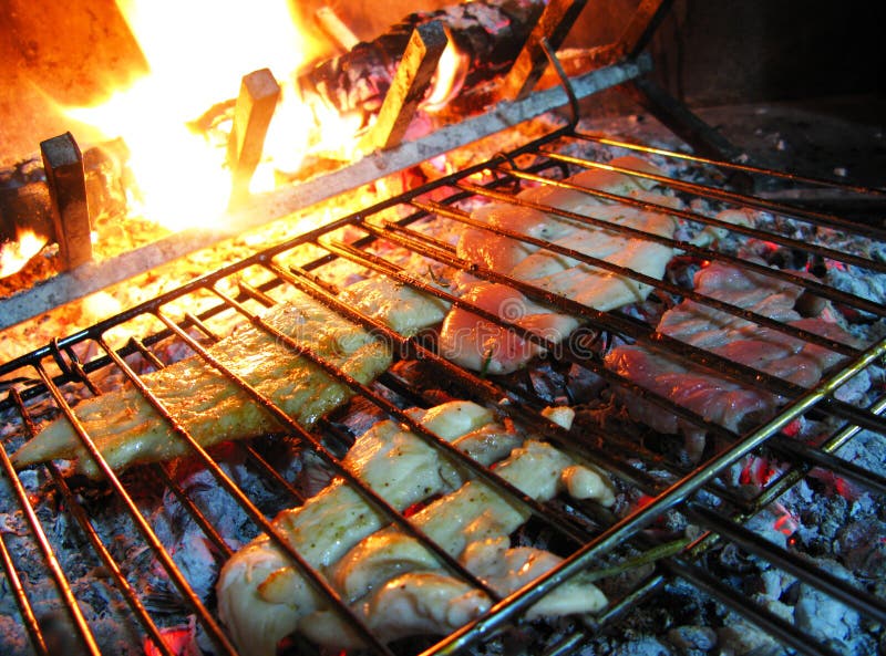 Meat Cooking In The Ground At Old Lahaina Luau, Maui, Hawaii Stock