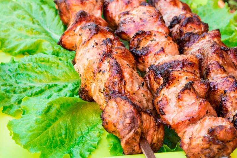 Cooking meat outdoors. Fried meat old recipe. royalty free stock photos Cooking meat outdoors. Fried meat old recipe. royalty free stock photos