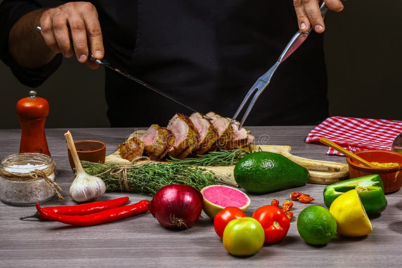 Cooking meat steak, vegetables and spices with by chef hands, steps process on kitchen on wooden background. Food recipe concept