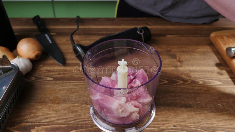 Cooking meat using a hand blender. stock photography Cooking meat using a hand blender. stock photography