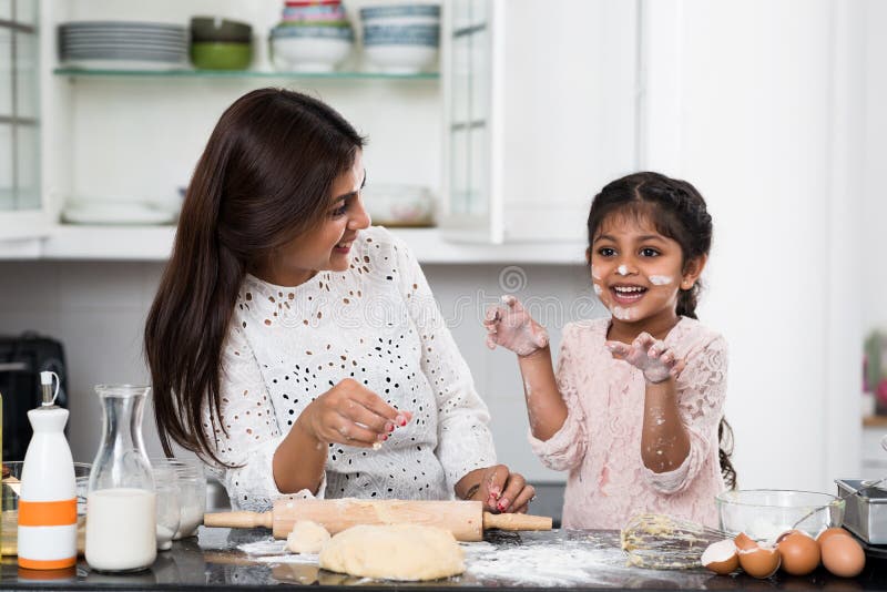 Cooking with mother stock photos Cooking with mother stock photos
