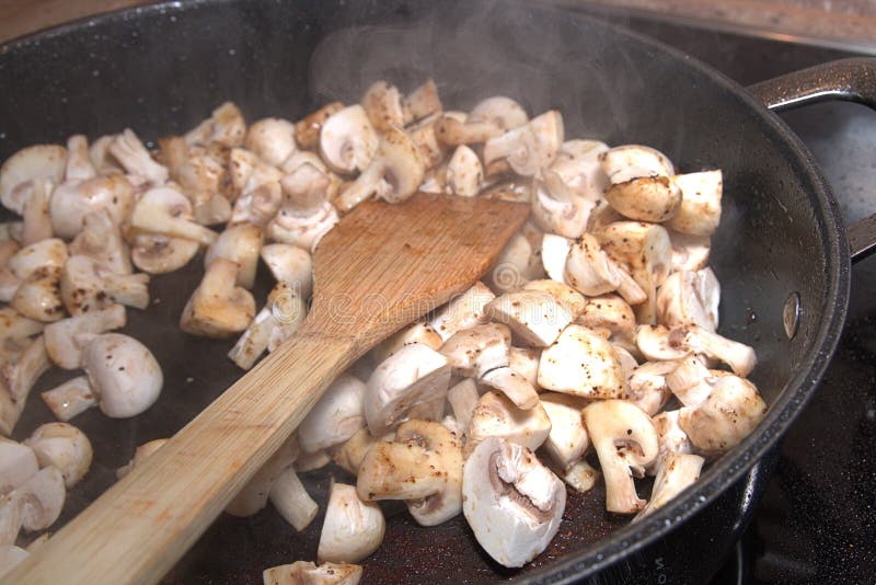 Cooking mushrooms stock photo. Image of brown, frying 85068664