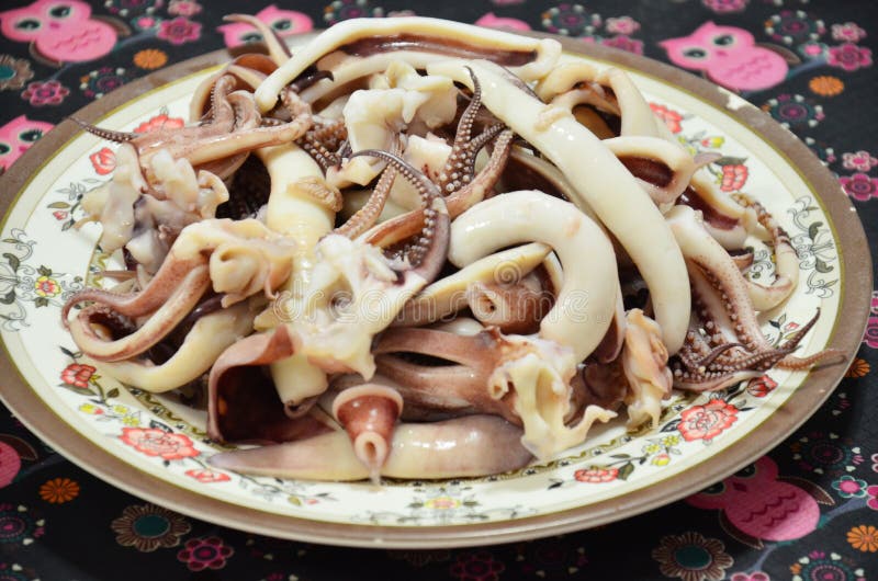 Cooking Octopus and Squid Boiled Stock Photo - Image of boiling