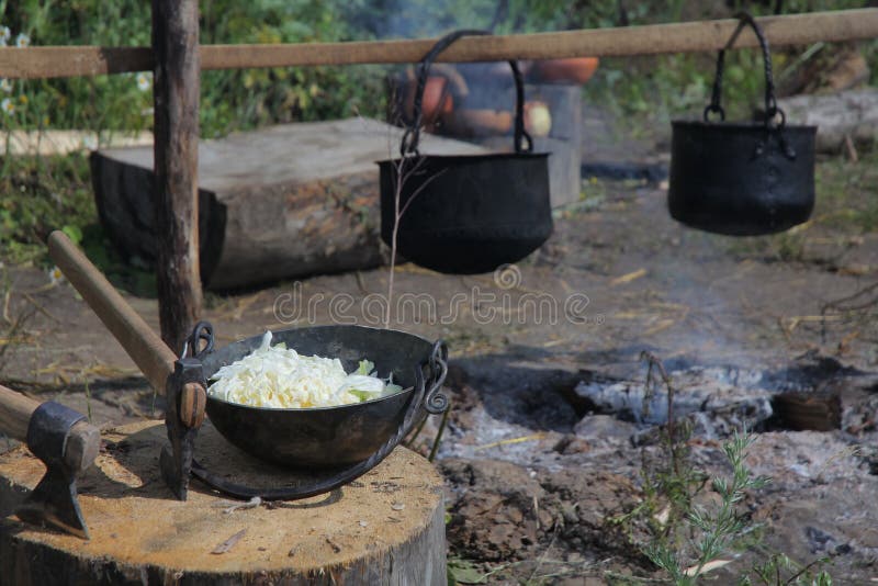 Cooking on an open fire stock photo. Image of aging, fuel 76824580