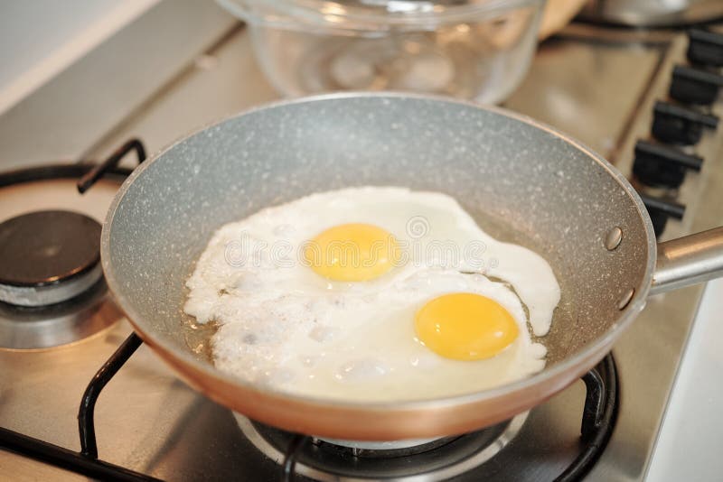 Cooking Pan with Fried Eggs Stock Image Image of baking, mixing