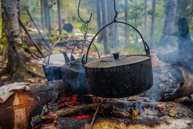 Cooking in a Pot Over a Fire in the Taiga Stock Photo Image of kettle