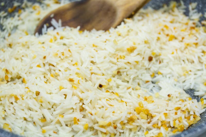 Cooking rice stock image. Image of aliment, rice, starchy - 194577751