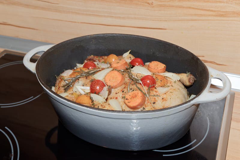 Cooking a Roast Duck in a Roaster on a Hot Plate Stock Photo Image of