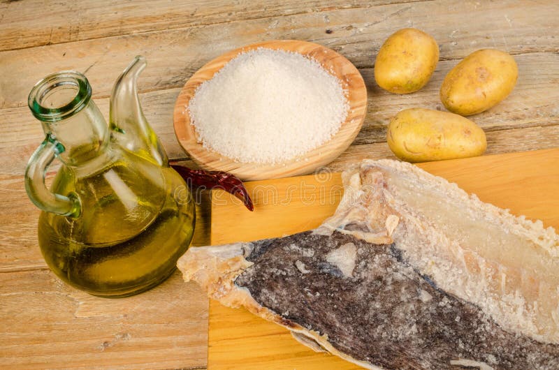 Cooking with salted cod stock photo. Image of salt, board