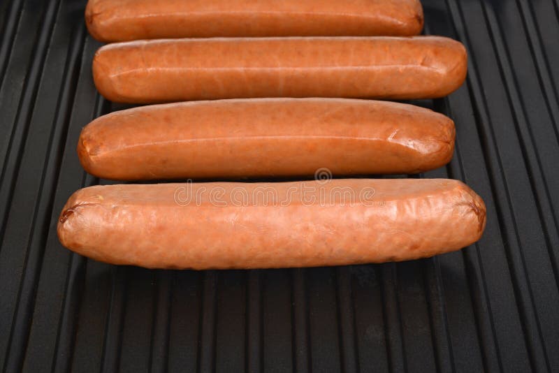 Cooking Sausages on a Black Grill Stock Image Image of cooking, american 71459463