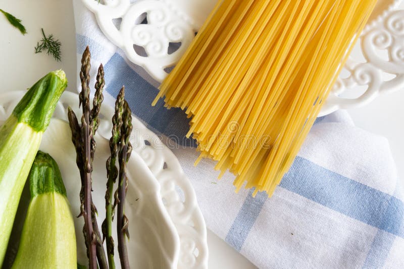 Cooking Spaghetti and Vegetables Wild Asparagus, Dill and Zucchini